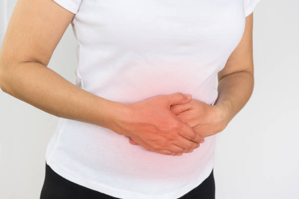 istock Woman having painful stomachache 1221117206