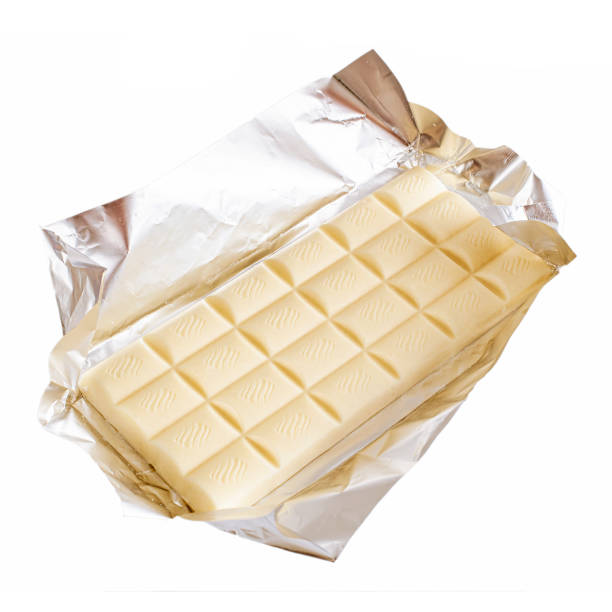 istock Sweet white chocolate plate isolated on white 1221119445