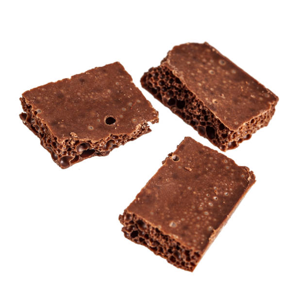 istock Popous milk black chocolate isolated on white 1221119888