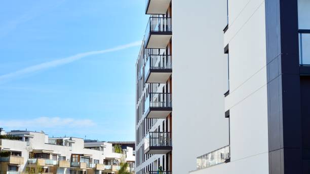 istock Modern condo building with big windows and modern facade. 1221124877