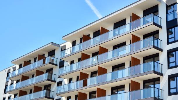 istock Modern condo building with big windows and modern facade. 1221125042