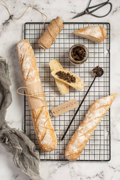 istock Fresh baked homemade crusty bread baguette. 1221125054