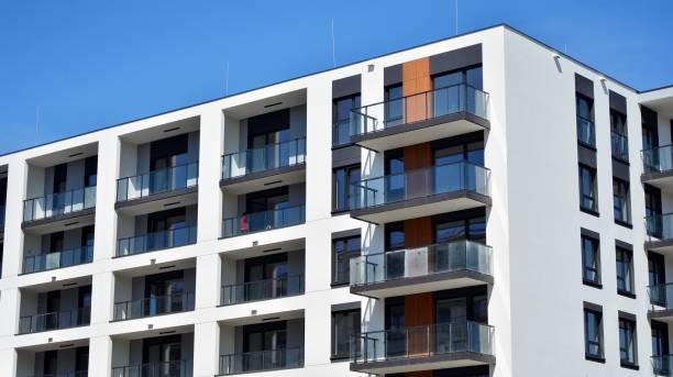 istock Modern condo building with big windows and modern facade. 1221125067