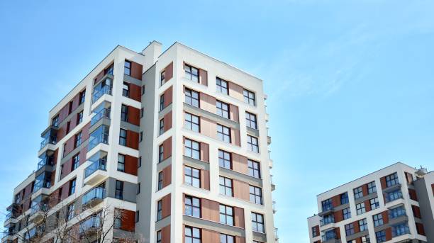 istock Modern condo building with big windows and modern facade. 1221125119