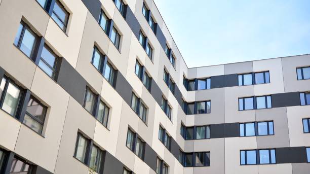 istock Modern condo building with big windows and modern facade. 1221125139