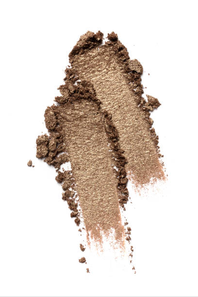 istock Broken shyny eyeshadow as sample of cosmetic product 1221127623
