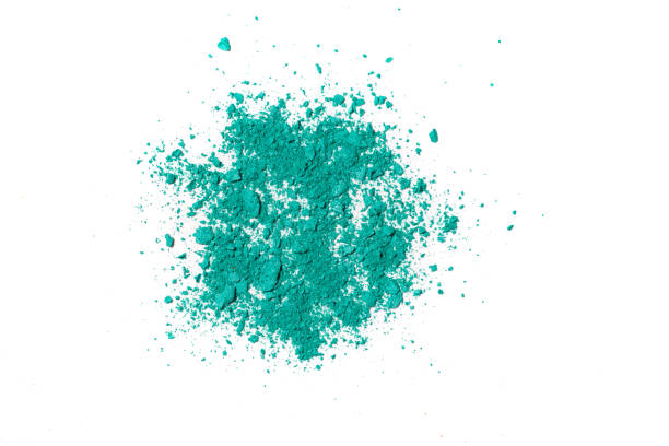 istock Green crushed eye shadow isolated on white background. 1221127702