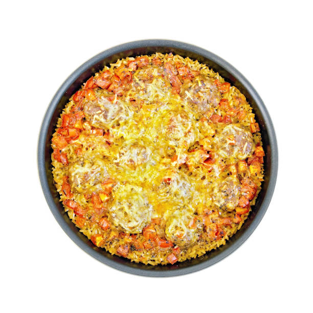 istock Casserole with meatballs and rice in frying pan 1221128414