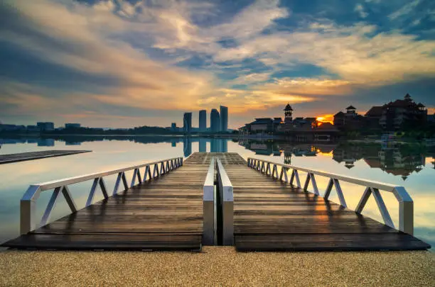 Photo of beautiful sunrise background surring lake shore in Putrajaya, Malaysia