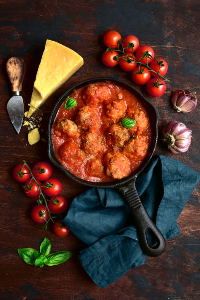 istock Meat balls in tomato sauce in a skillet 1221131981