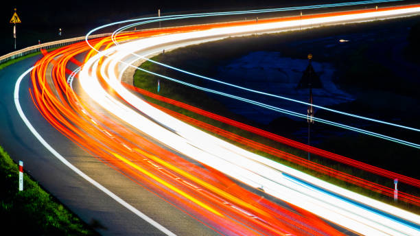 istock lights of cars with night 1221132132