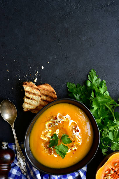 istock Hot spicy autumn pumpkin soup 1221133010