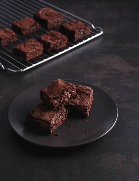 istock Brownies on dark table and Stainless cooking rack 1221135389