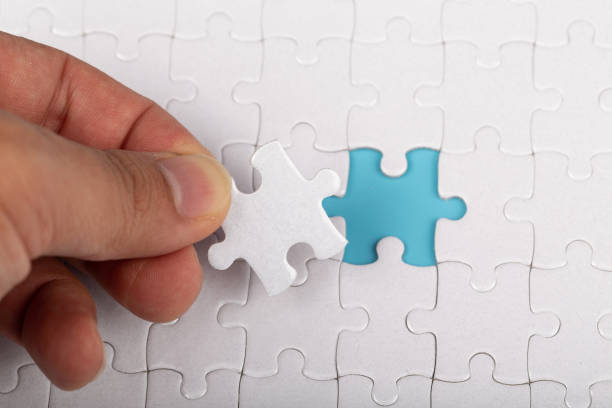 istock The last piece of white jigsaw puzzle. 1221140400