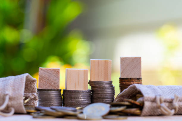 istock sack bag , Malaysia Ringgit coin and wooden blank block on wooden table.- Saving Concept 1221143116