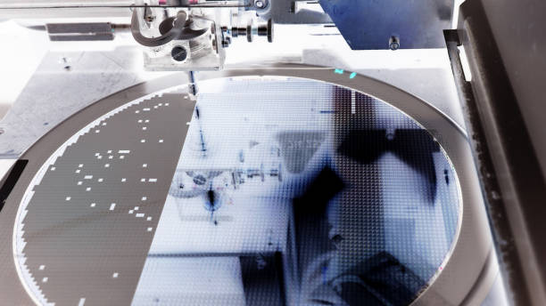istock Silicon wafer negative color in machine in semiconductor manufacturing 1221143147