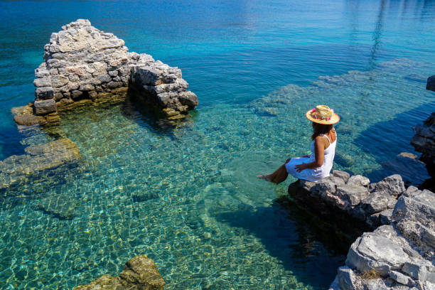 istock Woman having fun in the sea. 1221143492
