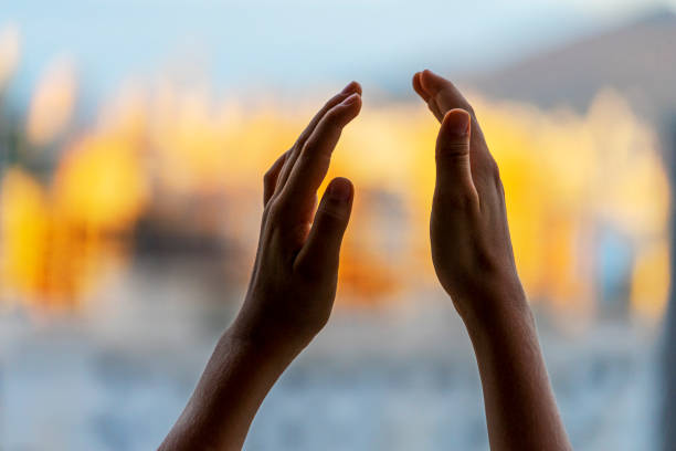 istock Kid clapping hands, applauding from balcony to support doctors, nurses, hospital workers during Coronavirus pandemic quarantine 1221144493