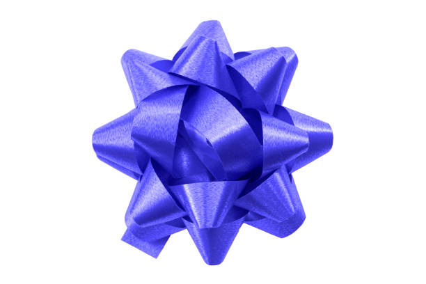 istock Shining anniversary gift and present decorating silky ornament concept with dark blue sleek polished glossy bow isolated on white background clipping path cutout 1221144773