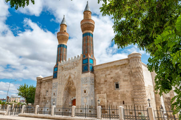 Gok Medrese in Sivas City, Turkey. August 24,2019:Gok Medrese in Sivas City, Turkey. The structure has the biggest portal among the other theological schools in Anatolia.It is a 13th-century madrasah, an Islamic educational institution minaret stock pictures, royalty-free photos & images