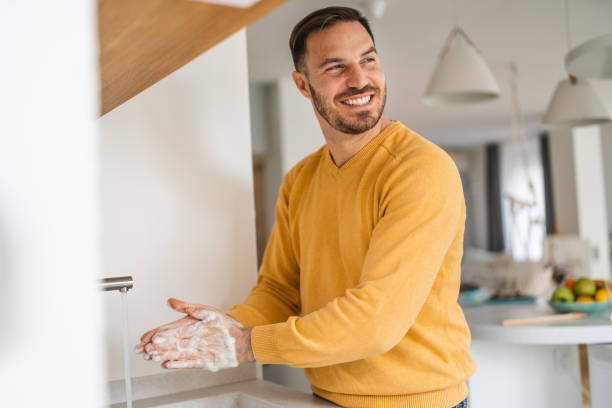 istock Coronavirus prevention. Man wash our hands with antibacterial soap. 1221148001
