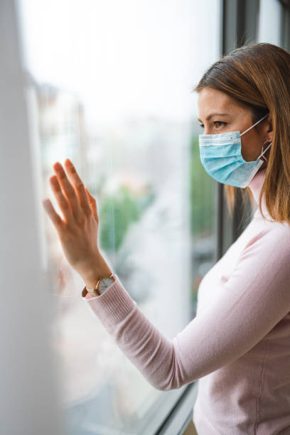 istock Woman wearing surgical mask for corona virus 1221148663