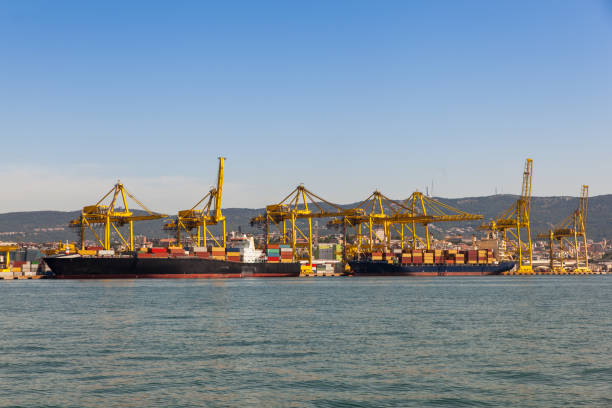 istock Industrial Container Cargo freight ship with working crane bridge in shipyard 1221151681