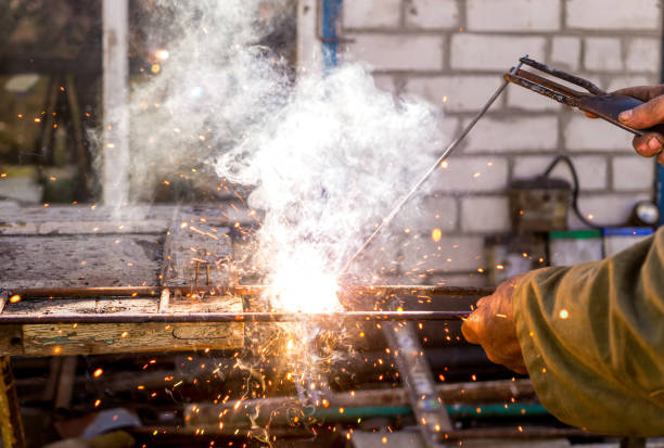 istock Village Workshop, Forge and Welding in the Spring Garden 1221154064