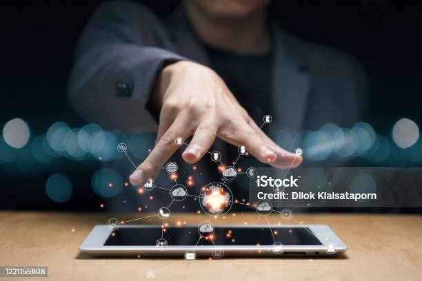 Businessman Hand Create Artificial Intelligence For Technology Transformation And Internet Of Thing On Tablet Cloud Technology Will Management Big Data Include Business Strategy Customer Service Stock Photo - Download Image Now