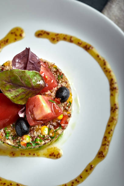 istock Delicious quinoa salad with avocado and tomatoes. Macro 1221158335