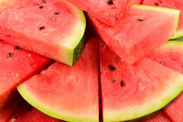 istock Juicy watermelon slices background. Top view. 1221158389