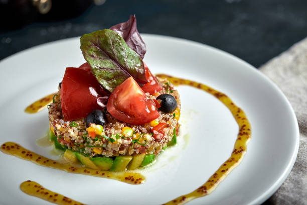 istock Delicious quinoa salad with avocado and tomatoes. Macro 1221158416