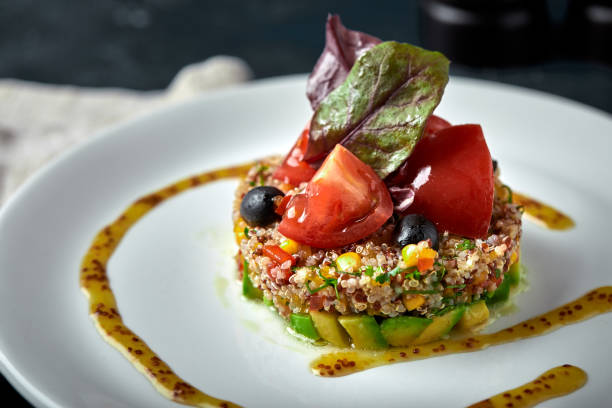 istock Delicious quinoa salad with avocado and tomatoes. Macro 1221158495