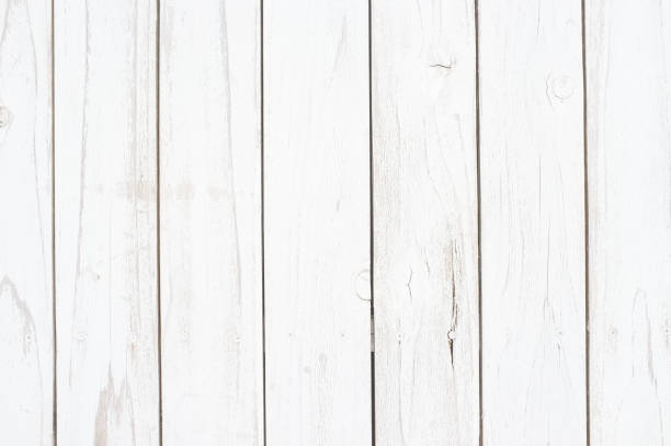 istock Weathered white wooden wall background 1221159178