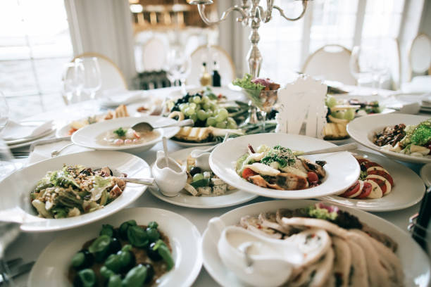 istock catering service. table with food and drink at restaurant before wedding party 1221163694