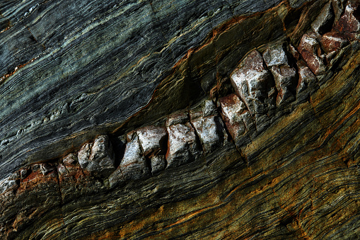 Horizontal close-up of stone pattern at the sea