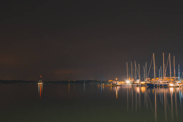 boats at harbour at night in Pula, Istrian Peninsula in Croatia