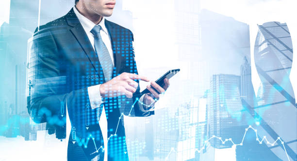 istock Broker with phone in city, digital chart 1221169825