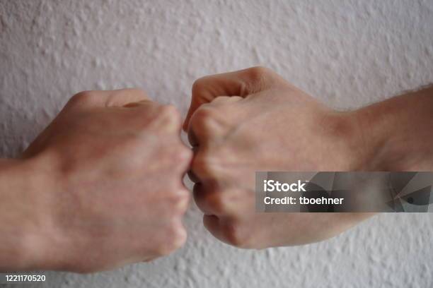 Fistbump Stock Photo - Download Image Now - Fist Bump, Germany, Greeting
