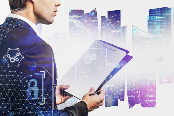 istock Man with clipboard in city, business interface 1221170535
