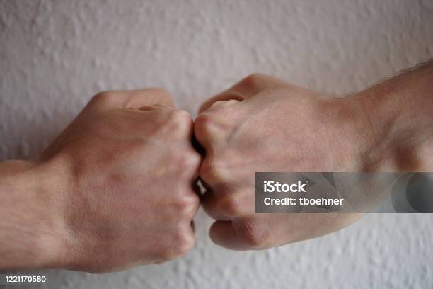 Fistbump Stock Photo - Download Image Now - Fist Bump, Germany, Greeting