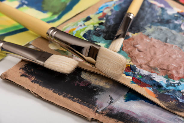 istock Brushes with bristles on the painting palette 1221170910
