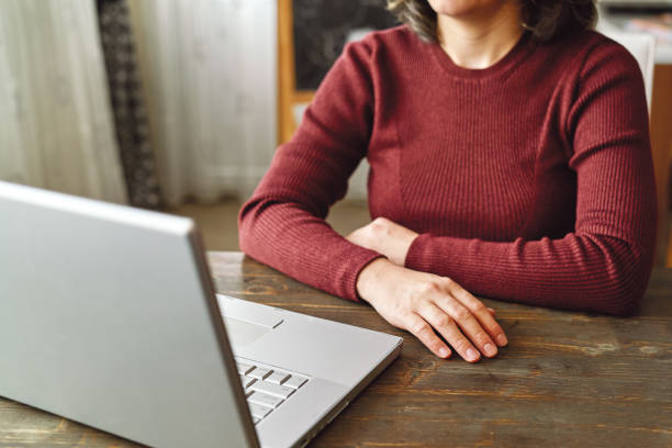 istock Happy family talking within video call on laptop for social distancing. 1221171796