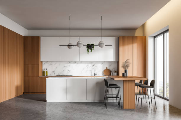 istock White and wood kitchen interior with bar 1221172164