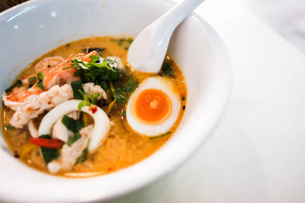 istock Tom Yum Seafood Noodle on a White Cup, Thailand. 1221172365