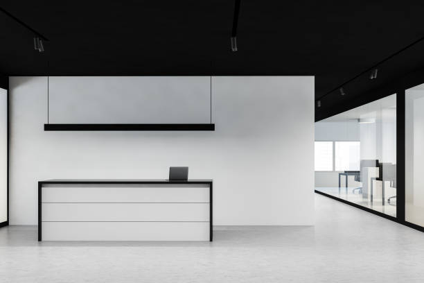 istock White and black reception desk in office hall 1221172407