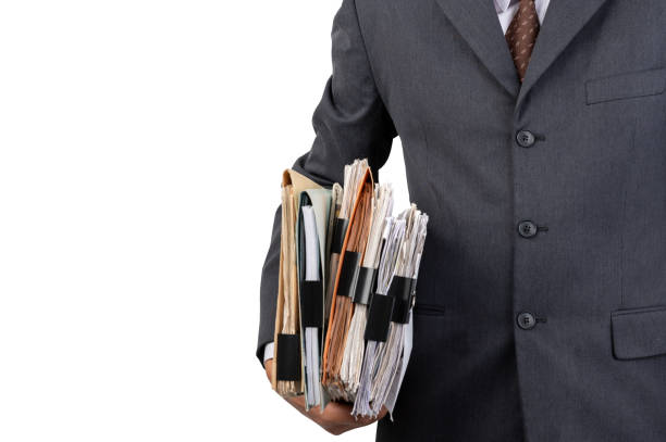 istock A businessman holding a file on isolated background and clipping path 1221173360