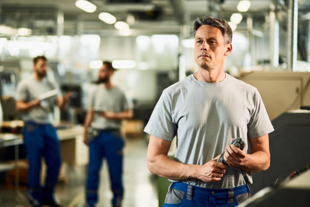 istock Portrait of industrial facility engineer at production line. 1221173802