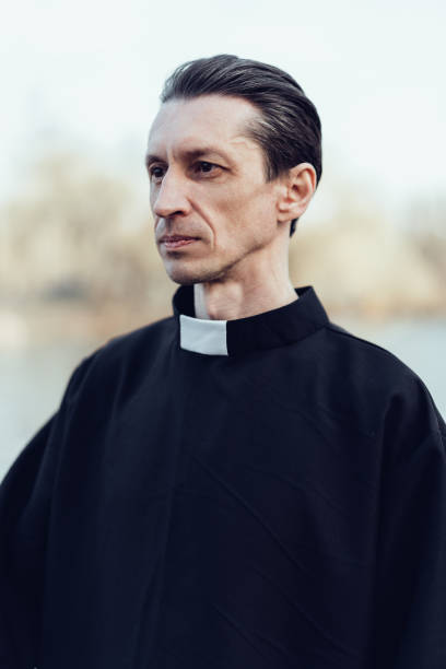 istock Portrait of handsome catholic priest or pastor with collar 1221174130