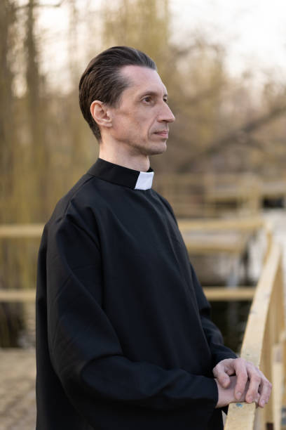 istock Portrait of handsome catholic priest or pastor with collar 1221174133